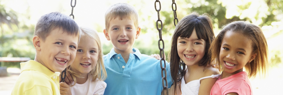 healthy children playing on swing