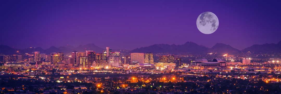 Phoenix Arizona Skyline at Night. Full Moon Over Phoenix, Arizona, United States.