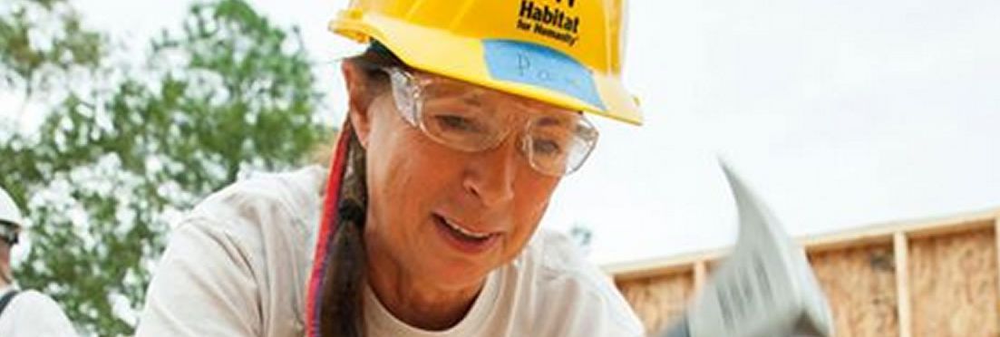 woman with hammer - photo from Habitat for Humanity Tucson