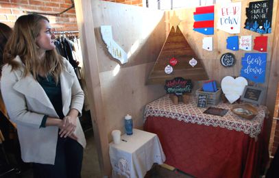 Local First - Modern Aquarian owner Ashley White with her booth