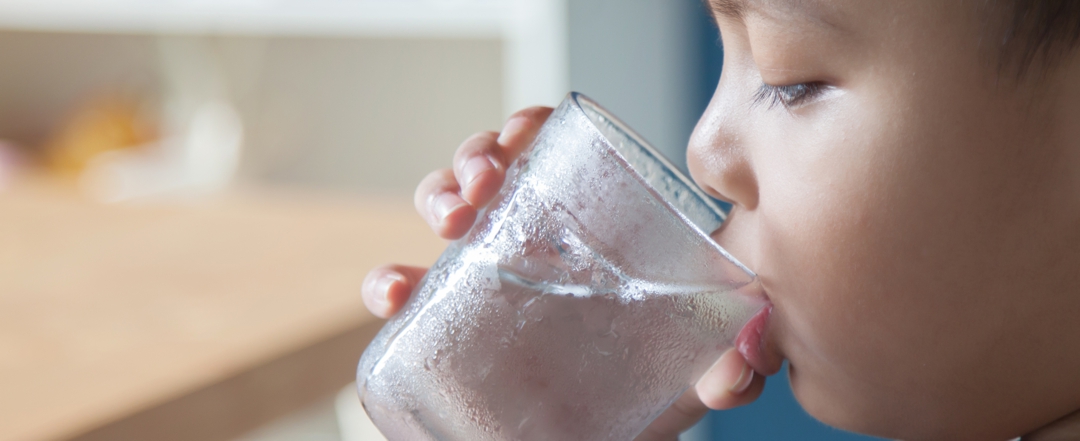 child drinking water