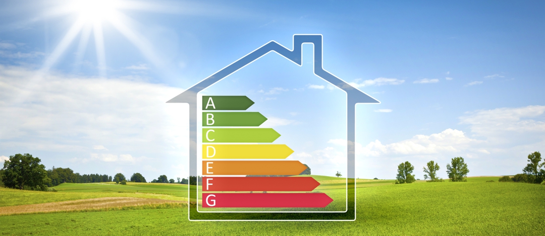 An image of a green house in the sun with energy efficiency graph