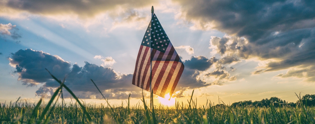 American flag at sunrise