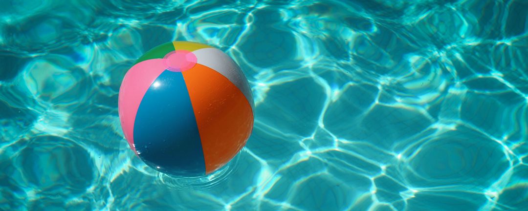 beach ball floating in swimming pool