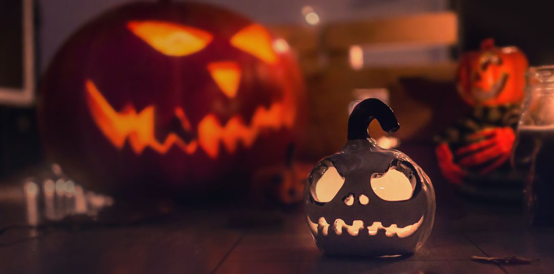 jack-o-lanterns at night lit up