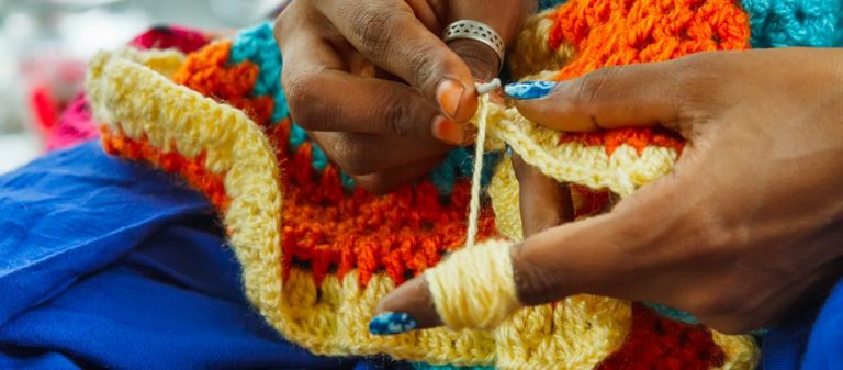 Hands of woman crocheting