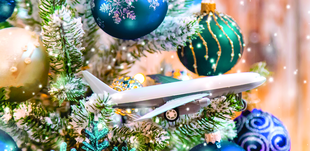 miniature airplane on holiday tree