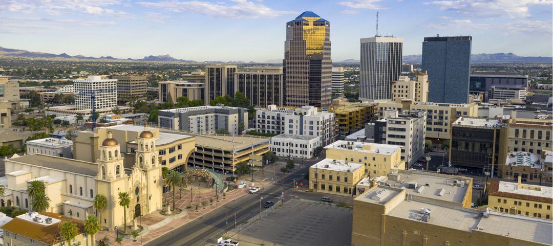 Golden light reflects off the buildings in the downtown city center of Tucson Arizona
