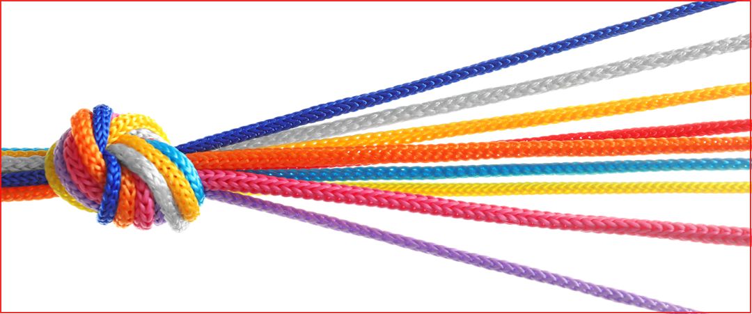 Colorful ropes tied together with knot on white background. Unity concept