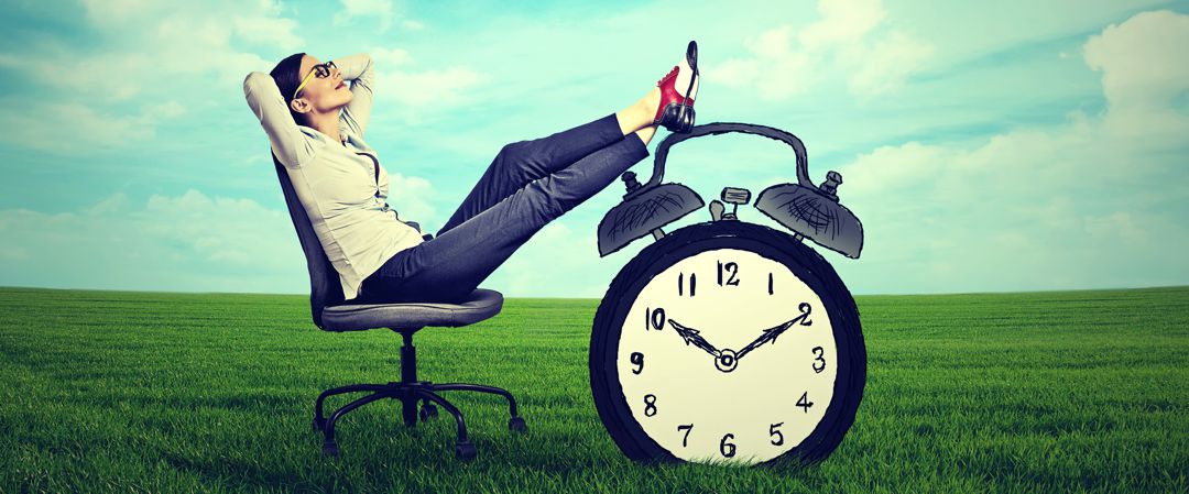 young business woman corporate executive relaxing sitting on a chair in the open air outdoors