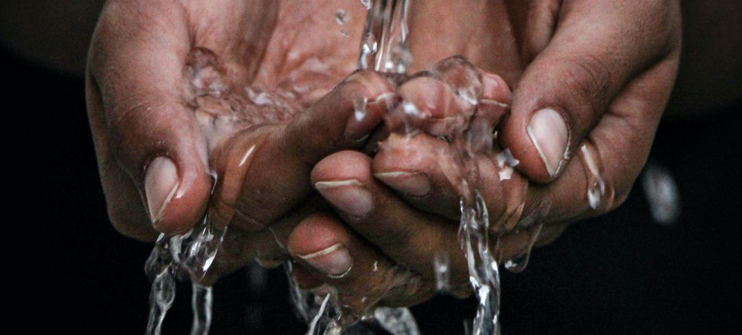 Water running through a pair of hands